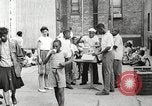 Standbild Afroamerikanische Kinder in Harlem New York City USA, 1935, aus Sekunde 23 historischem Filmmaterial Videoclip 65675063279