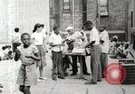 Standbild Afroamerikanische Kinder in Harlem New York City USA, 1935, aus Sekunde 25 historischem Filmmaterial Videoclip 65675063279