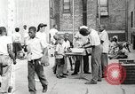 Standbild Afroamerikanische Kinder in Harlem New York City USA, 1935, aus Sekunde 29 historischem Filmmaterial Videoclip 65675063279