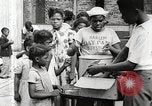 Standbild Afroamerikanische Kinder in Harlem New York City USA, 1935, aus Sekunde 34 historischem Filmmaterial Videoclip 65675063279