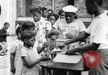 Standbild Afroamerikanische Kinder in Harlem New York City USA, 1935, aus Sekunde 35 historischem Filmmaterial Videoclip 65675063279