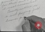 Immagine di Salone di bellezza per donne afroamericane ad Harlem New York City USA, 1940, secondo 4 filmato di repertorio 65675063284