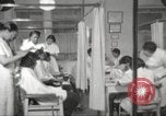 Immagine di Salone di bellezza per donne afroamericane ad Harlem New York City USA, 1940, secondo 21 filmato di repertorio 65675063284