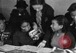 Immagine di Per donna giovane Associazione Cristiana Harlem New York City USA, 1940, secondo 16 filmato di repertorio 65675063294