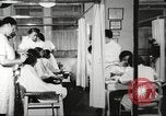 Immagine di Salone di bellezza dell'Associazione cristiana delle giovani Donne Harlem New York City USA, 1940, secondo 3 filmato di repertorio 65675063300