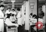 Immagine di Salone di bellezza dell'Associazione cristiana delle giovani Donne Harlem New York City USA, 1940, secondo 6 filmato di repertorio 65675063300