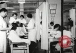Immagine di Salone di bellezza dell'Associazione cristiana delle giovani Donne Harlem New York City USA, 1940, secondo 7 filmato di repertorio 65675063300