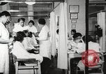 Immagine di Salone di bellezza dell'Associazione cristiana delle giovani Donne Harlem New York City USA, 1940, secondo 9 filmato di repertorio 65675063300