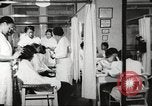 Immagine di Salone di bellezza dell'Associazione cristiana delle giovani Donne Harlem New York City USA, 1940, secondo 10 filmato di repertorio 65675063300
