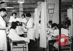 Immagine di Salone di bellezza dell'Associazione cristiana delle giovani Donne Harlem New York City USA, 1940, secondo 11 filmato di repertorio 65675063300