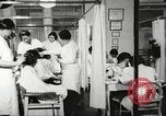 Immagine di Salone di bellezza dell'Associazione cristiana delle giovani Donne Harlem New York City USA, 1940, secondo 13 filmato di repertorio 65675063300