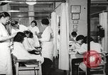 Immagine di Salone di bellezza dell'Associazione cristiana delle giovani Donne Harlem New York City USA, 1940, secondo 16 filmato di repertorio 65675063300