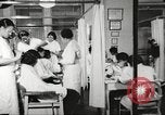 Immagine di Salone di bellezza dell'Associazione cristiana delle giovani Donne Harlem New York City USA, 1940, secondo 19 filmato di repertorio 65675063300