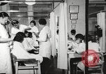 Immagine di Salone di bellezza dell'Associazione cristiana delle giovani Donne Harlem New York City USA, 1940, secondo 20 filmato di repertorio 65675063300