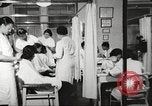 Immagine di Salone di bellezza dell'Associazione cristiana delle giovani Donne Harlem New York City USA, 1940, secondo 23 filmato di repertorio 65675063300