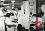 Immagine di Salone di bellezza dell'Associazione cristiana delle giovani Donne Harlem New York City USA, 1940, secondo 26 filmato di repertorio 65675063300