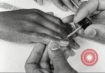 Immagine di Salone di bellezza dell'Associazione cristiana delle giovani Donne Harlem New York City USA, 1940, secondo 33 filmato di repertorio 65675063300