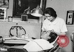 Immagine di Salone di bellezza dell'Associazione cristiana delle giovani Donne Harlem New York City USA, 1940, secondo 37 filmato di repertorio 65675063300
