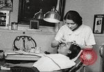 Immagine di Salone di bellezza dell'Associazione cristiana delle giovani Donne Harlem New York City USA, 1940, secondo 39 filmato di repertorio 65675063300