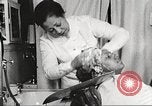 Immagine di Salone di bellezza dell'Associazione cristiana delle giovani Donne Harlem New York City USA, 1940, secondo 50 filmato di repertorio 65675063300