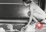 Immagine di Per donna giovane Associazione Cristiana Harlem New York City USA, 1940, secondo 9 filmato di repertorio 65675063302
