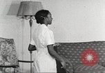 Immagine di Per donna giovane Associazione Cristiana Harlem New York City USA, 1940, secondo 45 filmato di repertorio 65675063303