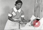 Immagine di Per donna giovane Associazione Cristiana Harlem New York City USA, 1940, secondo 5 filmato di repertorio 65675063304