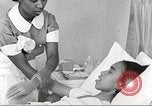 Immagine di Per donna giovane Associazione Cristiana Harlem New York City USA, 1940, secondo 6 filmato di repertorio 65675063304