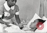Immagine di Per donna giovane Associazione Cristiana Harlem New York City USA, 1940, secondo 7 filmato di repertorio 65675063304