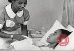 Immagine di Per donna giovane Associazione Cristiana Harlem New York City USA, 1940, secondo 8 filmato di repertorio 65675063304