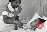 Immagine di Per donna giovane Associazione Cristiana Harlem New York City USA, 1940, secondo 9 filmato di repertorio 65675063304