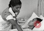 Immagine di Per donna giovane Associazione Cristiana Harlem New York City USA, 1940, secondo 10 filmato di repertorio 65675063304