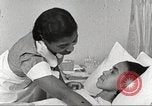 Immagine di Per donna giovane Associazione Cristiana Harlem New York City USA, 1940, secondo 12 filmato di repertorio 65675063304