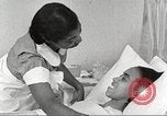 Immagine di Per donna giovane Associazione Cristiana Harlem New York City USA, 1940, secondo 15 filmato di repertorio 65675063304