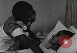 Immagine di Per donna giovane Associazione Cristiana Harlem New York City USA, 1940, secondo 18 filmato di repertorio 65675063304
