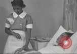 Immagine di Per donna giovane Associazione Cristiana Harlem New York City USA, 1940, secondo 20 filmato di repertorio 65675063304