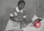 Immagine di Per donna giovane Associazione Cristiana Harlem New York City USA, 1940, secondo 23 filmato di repertorio 65675063304