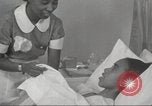 Immagine di Per donna giovane Associazione Cristiana Harlem New York City USA, 1940, secondo 26 filmato di repertorio 65675063304