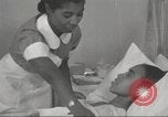 Immagine di Per donna giovane Associazione Cristiana Harlem New York City USA, 1940, secondo 28 filmato di repertorio 65675063304