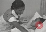 Immagine di Per donna giovane Associazione Cristiana Harlem New York City USA, 1940, secondo 29 filmato di repertorio 65675063304