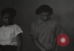 Immagine di Per donna giovane Associazione Cristiana Harlem New York City USA, 1940, secondo 50 filmato di repertorio 65675063306