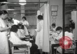 Image of African American women hair style Harlem New York City USA, 1940, second 27 stock footage video 65675063313