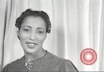 Image of African American women hair style Harlem New York City USA, 1940, second 52 stock footage video 65675063313