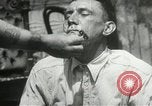 Immagine di American disoccupati operai New York City USA, 1932, secondo 60 filmato di repertorio 65675063353