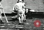 Image of Harvard 8 man crew participating in regatta on Thames River at New Lon New London Connecticut USA, 1900, second 18 stock footage video 65675063383