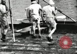 Image of Harvard 8 man crew participating in regatta on Thames River at New Lon New London Connecticut USA, 1900, second 19 stock footage video 65675063383