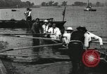 Image of Harvard 8 man crew participating in regatta on Thames River at New Lon New London Connecticut USA, 1900, second 57 stock footage video 65675063383