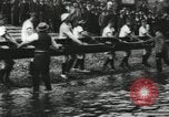 Image of Scenes from an annual Harvard and Yale rowing race on the Thames River New London Connecticut USA, 1900, second 13 stock footage video 65675063384