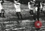 Image of Scenes from an annual Harvard and Yale rowing race on the Thames River New London Connecticut USA, 1900, second 15 stock footage video 65675063384