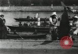 Image of Scenes from an annual Harvard and Yale rowing race on the Thames River New London Connecticut USA, 1900, second 19 stock footage video 65675063384